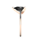 Side profile product photo of the Calista ring, displaying the clean, secure three-prong claw basket setting holding the 2-carat pear black diamond.