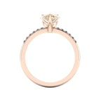 Through-finger view of the 18ct rose gold champagne diamond ring, showing the smooth, polished interior under-gallery and precise stone settings.