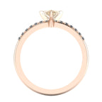 Through-finger view of the 18ct rose gold diamond ring, showing the polished interior under-gallery and precise stone settings.