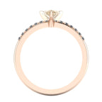 Calista pear shaped champagne diamond engagement ring in 18ct rose gold, through-finger view showing the polished under-gallery and precise diamond settings, handmade in our London studio