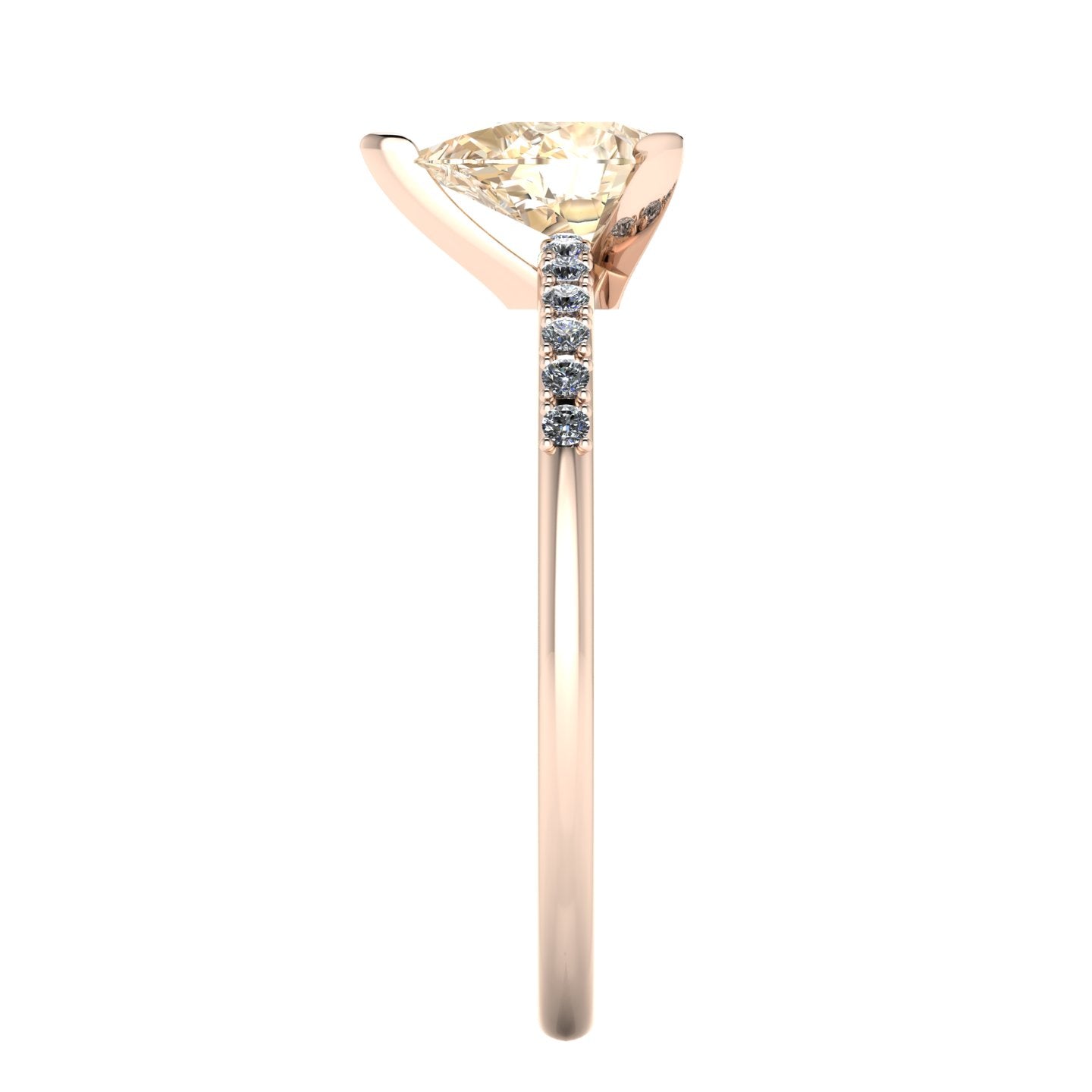 Side profile product photo of the Calista ring, displaying the elegant three-prong claw setting holding the pear-cut champagne diamond.