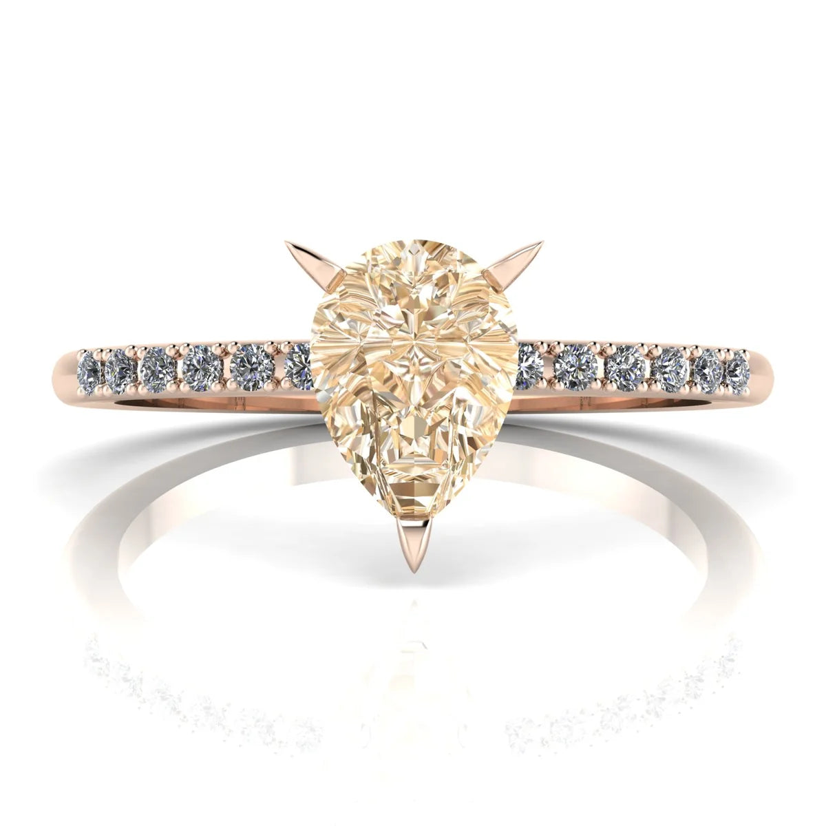 Calista pear shaped champagne diamond engagement ring in 18ct rose gold, front hero view showing the warm pear-shaped champagne diamond and white diamond shoulders, handmade in our London studio