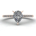 Calista engagement ring, featuring a brilliant pear-shaped lab-grown diamond on an 18ct rose gold band with diamond shoulders.