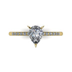 Detail image of the Calista alternative engagement ring, showing the exceptional clarity and light reflection within the yellow gold lab diamond ring.