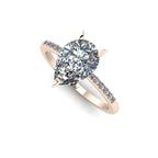 High angle studio detail shot of the Calista alternative engagement ring, showing the exceptional clarity, cut, and intense light reflection within the 2-carat pear diamond.