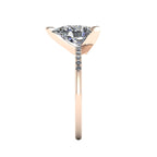Side profile product photo of the Calista ring, displaying the elegant three-prong claw basket setting securely holding the substantial 2-carat pear lab diamond.