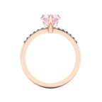 Through-finger view of the 18ct rose gold morganite ring, showing the smooth interior under-gallery and precise stone settings.