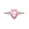 Calista engagement ring, featuring a beautiful 2-carat pear-shaped morganite on a polished 18ct rose gold band with sparkling diamond shoulders.