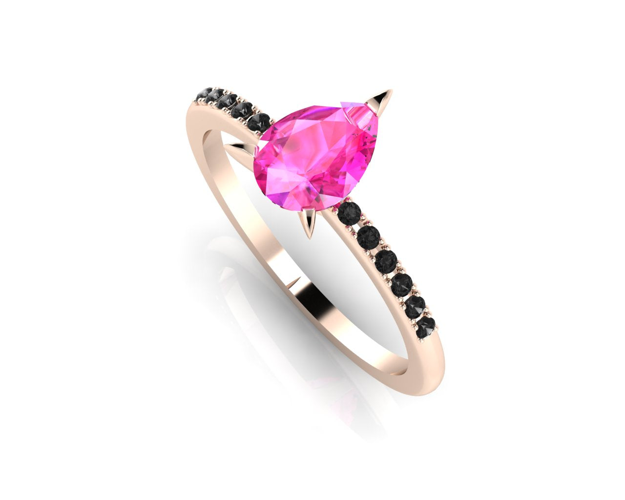 Front three-quarter studio view of the Calista pink sapphire ring, highlighting the moody, edgy contrast of the black diamonds set into the rose gold shoulders.