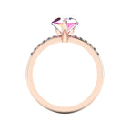 Through-finger view of the 18ct rose gold pink sapphire ring, showing the smooth interior under-gallery and precise stone settings.