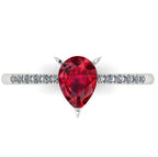 Detail shot of the Calista engagement ring, showing the deep red clarity and exceptional facet light reflection within the ruby centre stone.