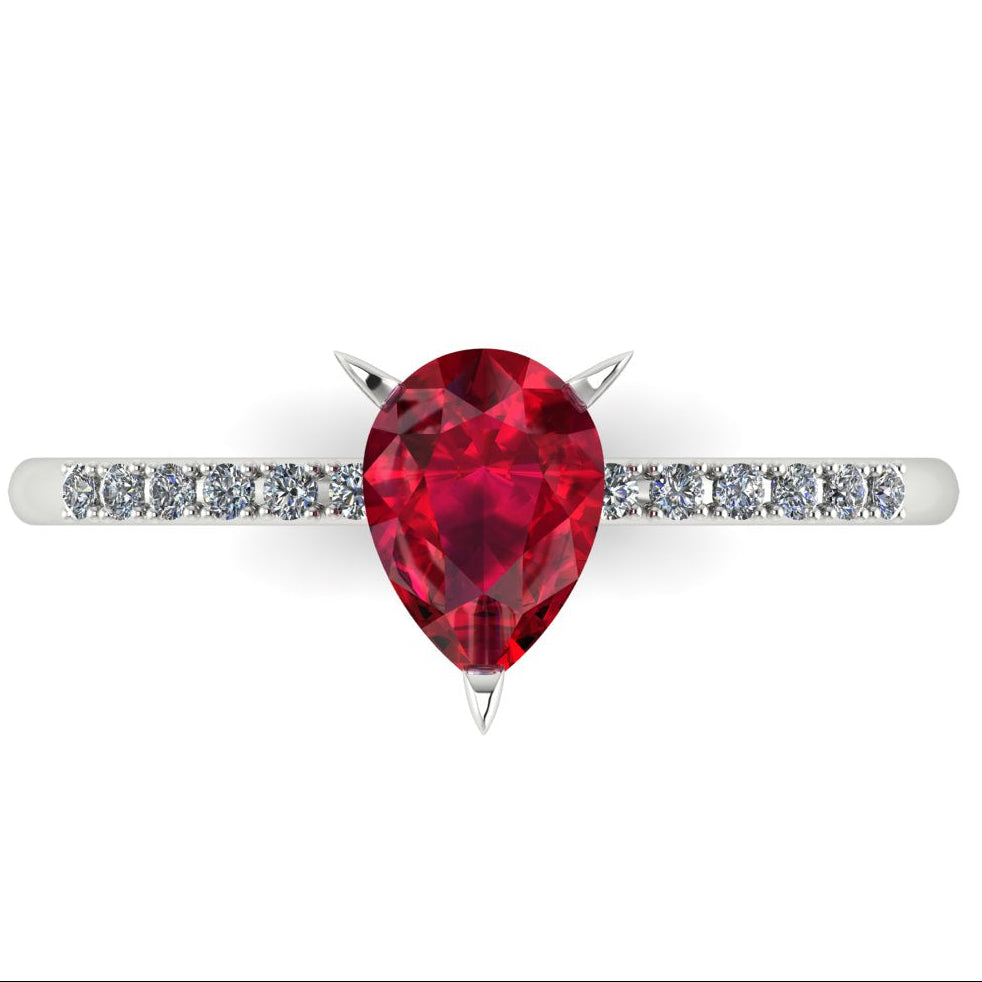 Detail shot of the Calista engagement ring, showing the deep red clarity and exceptional facet light reflection within the ruby centre stone.