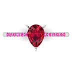 detail shot of the Calista alternative engagement ring, showing the deep red clarity of the ruby alongside the bright pink hue of the shoulder stones.