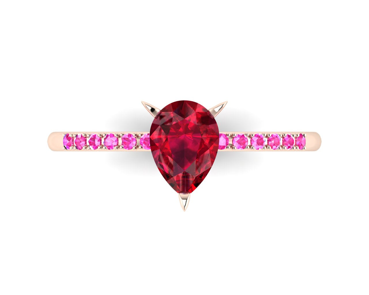High angle studio detail shot of the Calista alternative bridal ring, showing the rich red clarity of the ruby alongside the bright pink hue of the shoulder stones.