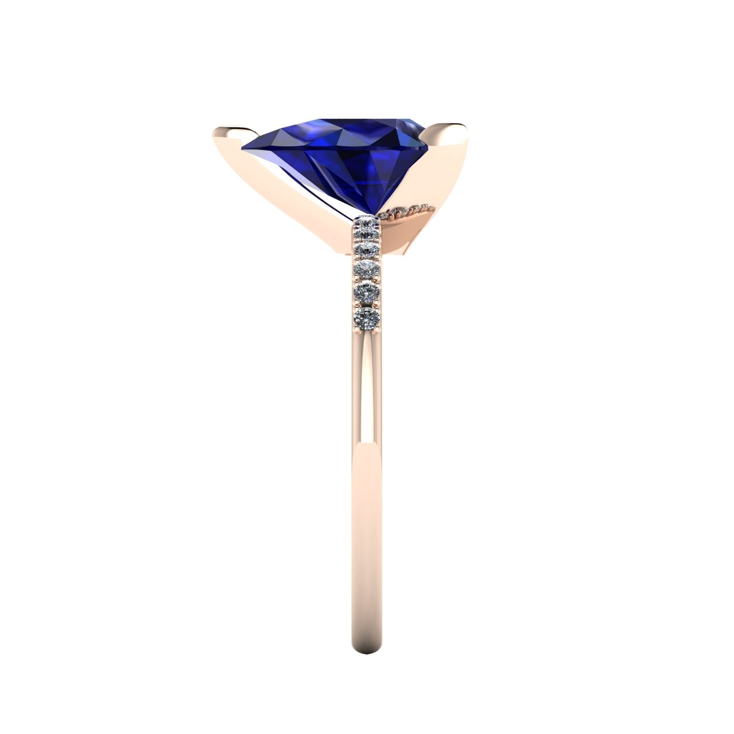 Side profile product photo of the Calista ring, displaying the clean, secure three-prong claw basket setting holding the 2-carat pear sapphire.