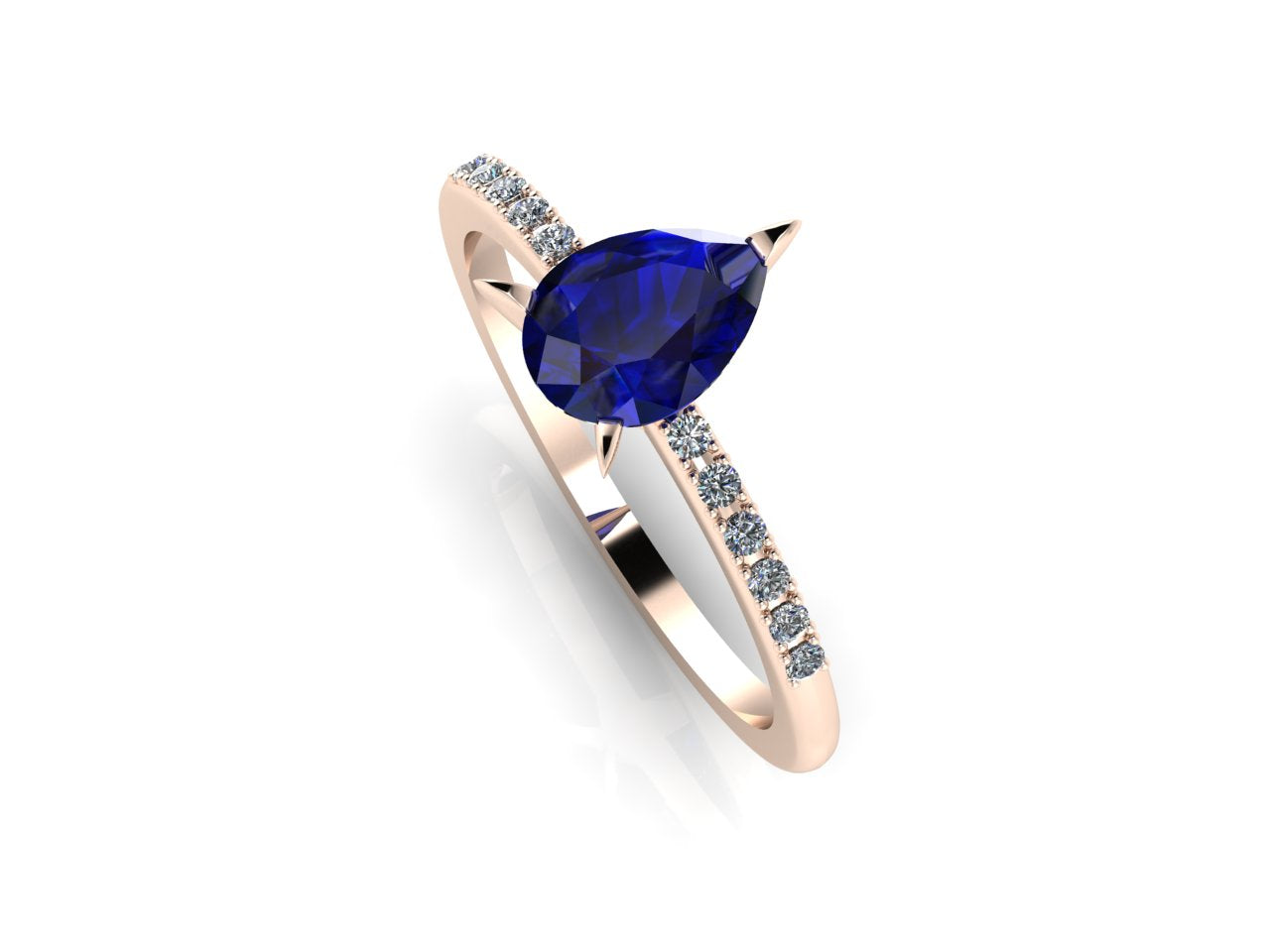 Front three-quarter studio view of the Calista sapphire ring, highlighting the brilliant white pavé diamonds set directly into the warm rose gold shoulders.