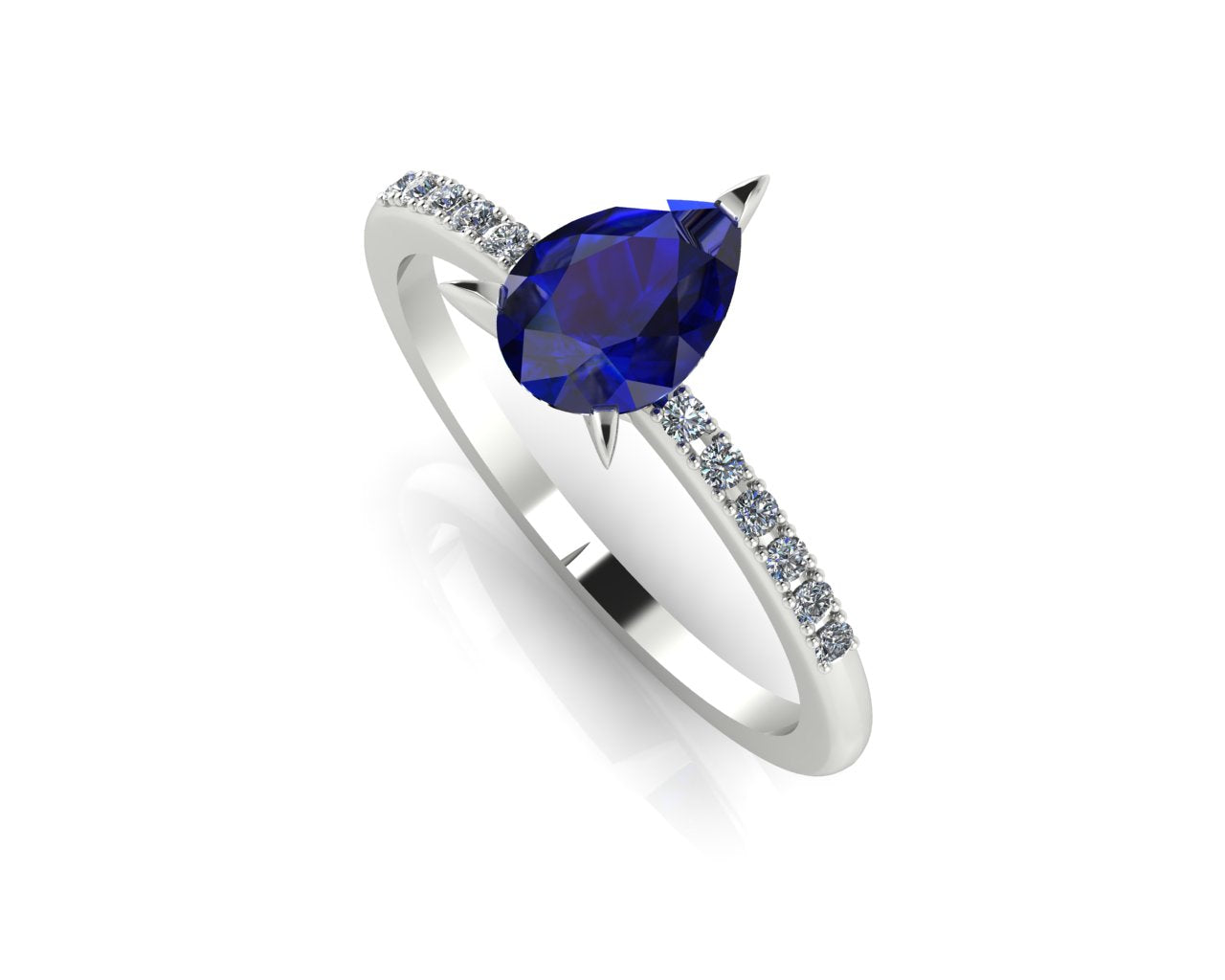 Front three-quarter studio view of the Calista sapphire ring, highlighting the row of brilliant white pavé diamonds set into the crisp, precious metal shoulders.