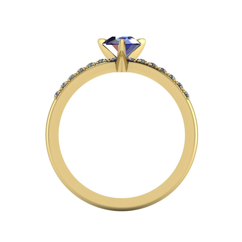 Through-finger view of the 18ct yellow gold sapphire ring, showing the smooth interior under-gallery and precise stone settings.