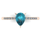 Calista 18ct rose gold ring, featuring a rich pear-shaped teal sapphire with white diamonds.