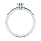 Calista pear shaped teal sapphire and diamond engagement ring in 18ct white gold, through-finger view showing the open gallery and teal sapphire setting, handmade in our London studio
