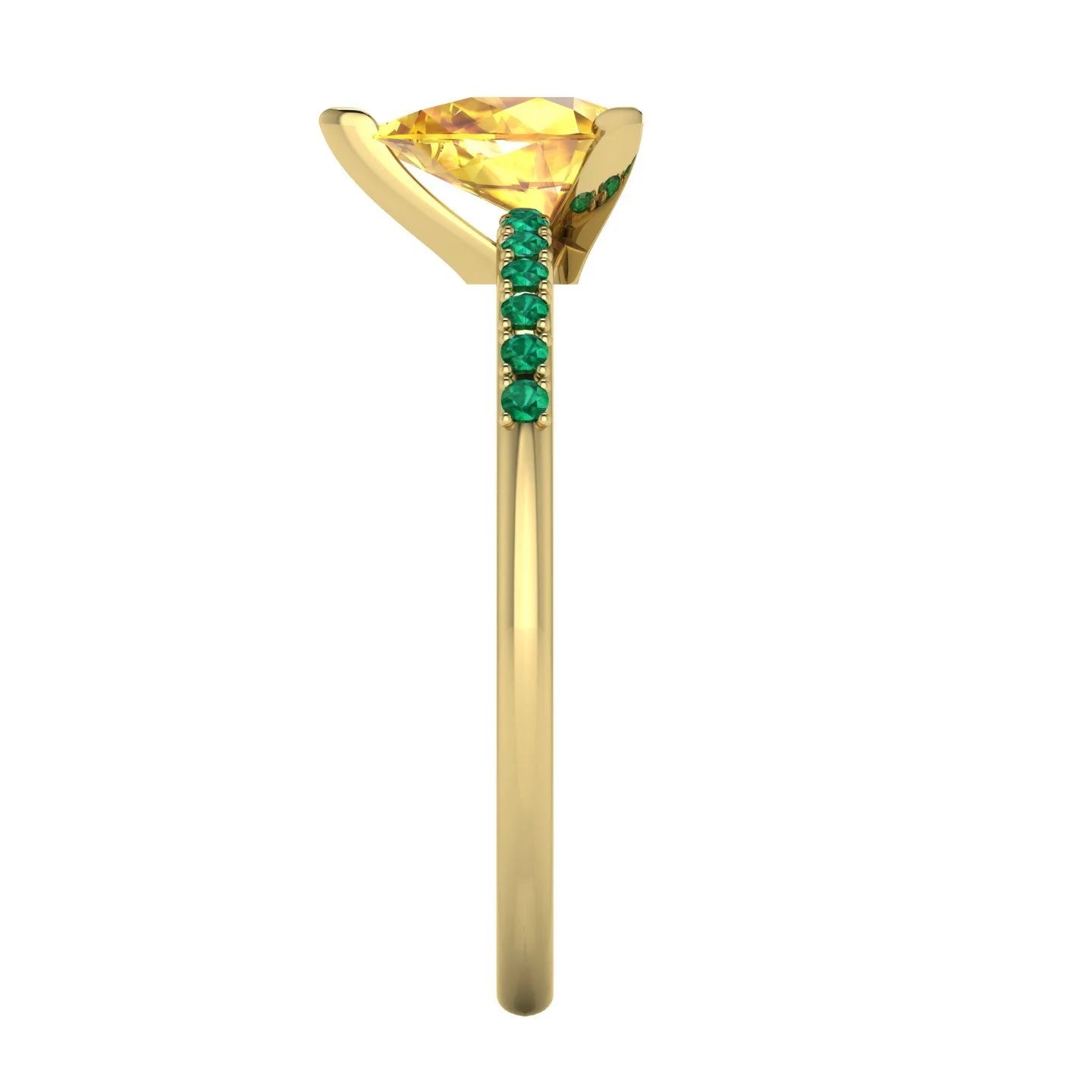 Side profile view of the yellow gold Calista ring, highlighting the detailed setting for the pear-cut sapphire and the emerald cluster shoulders.