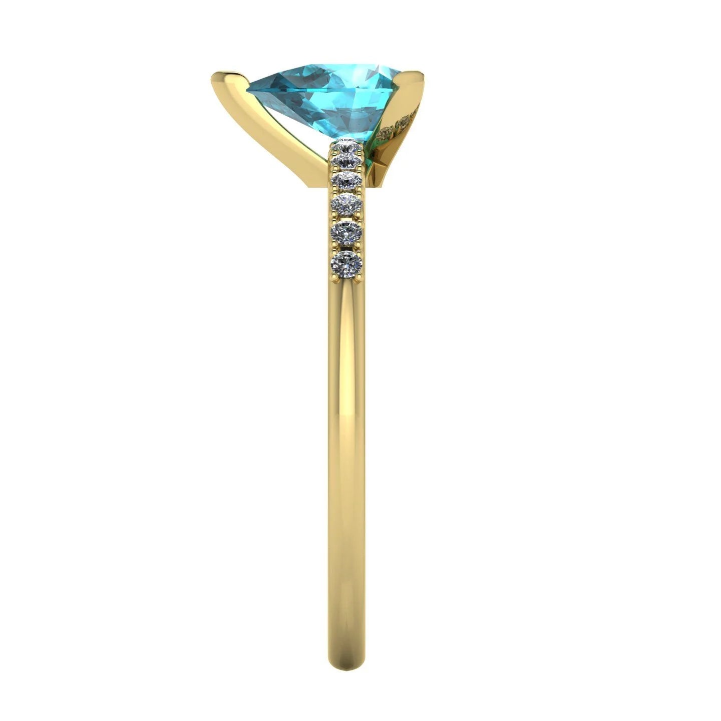 Side profile product photo of the yellow gold Calista ring, highlighting the elegant raised basket setting for the pear sapphire.