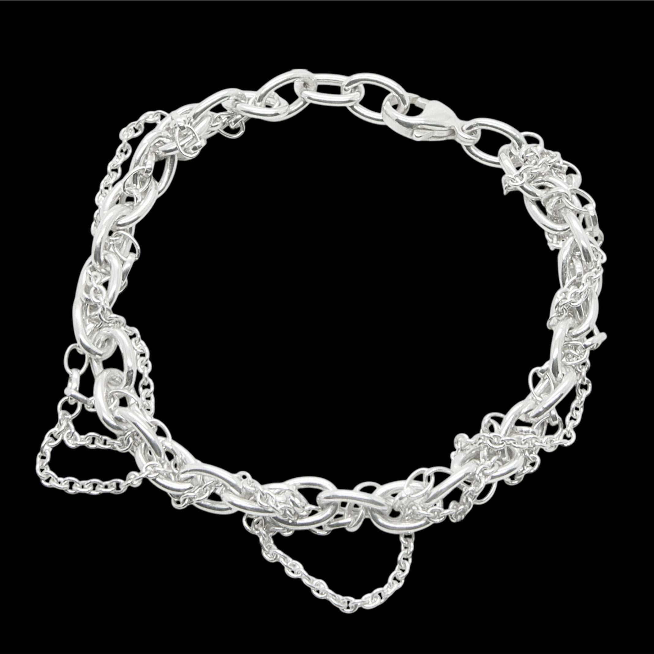 Close-up detail of Chain Reaction chunky silver chain bracelet, handmade in Surrey