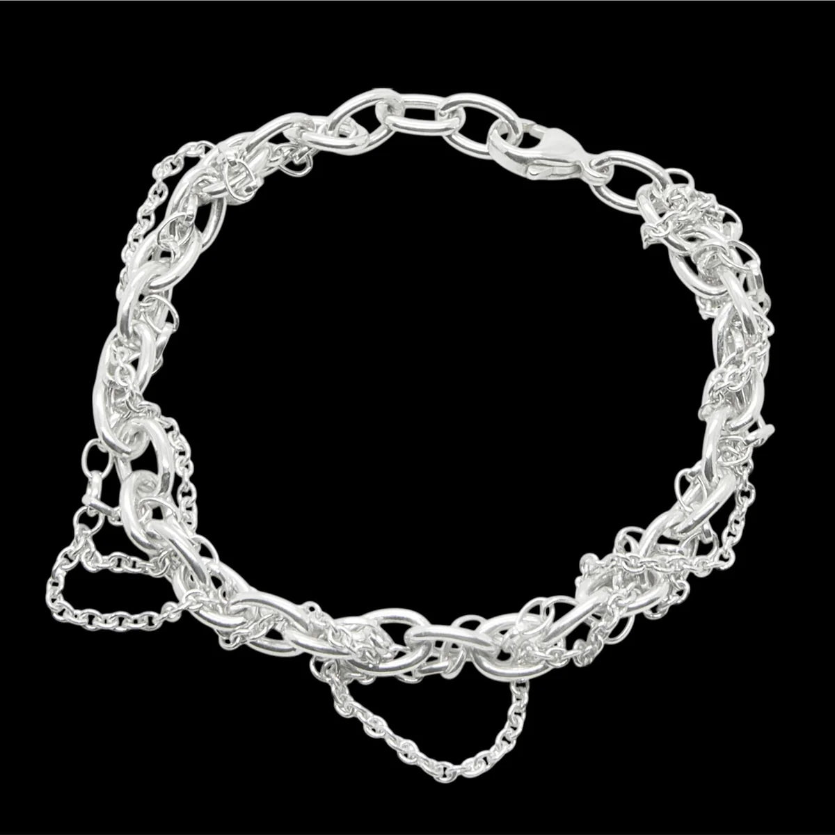 Close-up detail of Chain Reaction chunky silver chain bracelet, handmade in London
