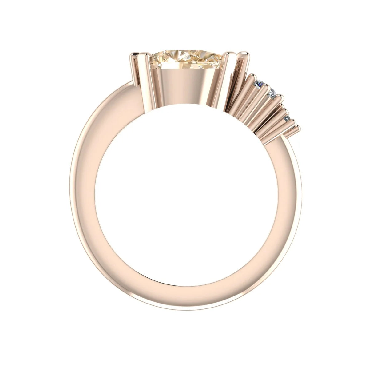 Through-finger view of the Comet rose gold ring, showing the raised champagne diamond setting and stepped settings for two smaller diamonds above the band.
