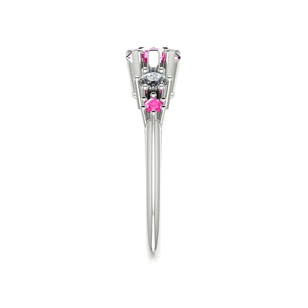 Side profile of the Comet pink sapphire and diamond asymmetrical ring in 18ct white gold, showing the sculptural claw setting and tapered split band