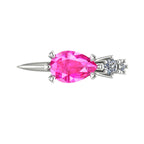Top-down view of the Comet ring showing the pear shaped pink sapphire set east-west with two graduating round diamonds trailing to one side in white gold