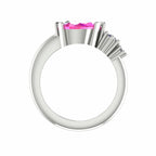 Front-on view of the Comet asymmetrical ring looking down the white gold shank, highlighting the two graduating diamond accent stones