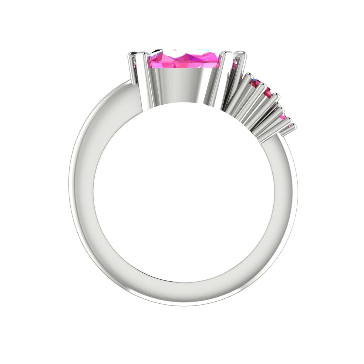Front-on view of the Comet asymmetrical ring looking down the white gold shank, highlighting the ruby and pink sapphire cluster setting