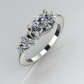 Comet Ring: Pear Shaped Lab Grown Diamonds Horizontally Set Trilogy Ring