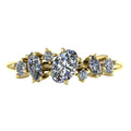 Top view of the Atlantis Paradise ring in 18ct yellow gold, featuring an asymmetrical cluster of three brilliant-cut diamonds.