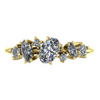 Top view of the Atlantis Paradise ring in 18ct yellow gold, featuring an asymmetrical cluster of three brilliant-cut diamonds.