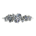 Front view of the Atlantis Paradise ring in polished white metal, featuring an asymmetrical cluster of three brilliant-cut diamonds.