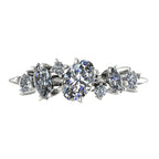 Front view of the Atlantis Paradise ring in polished white metal, featuring an asymmetrical cluster of three brilliant-cut diamonds.
