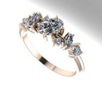 An angled perspective of the Atlantis Paradise ring highlighting the three-dimensional layout of the diamond cluster.