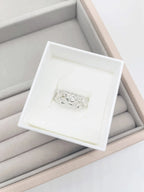 Origin Honeycomb Ring with a brilliant-cut diamond in sterling silver, presented in a Nude Jewellery box