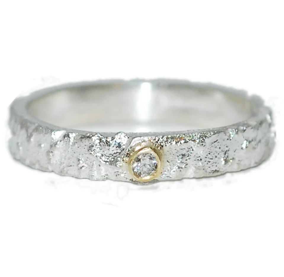 Rivda diamond ring in sterling silver with 9ct gold setting — front view