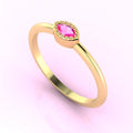 Three-quarter angled view of the dainty pink sapphire Mini Astraea ring highlighting the modern horizontal setting and vibrant gemstone colour.