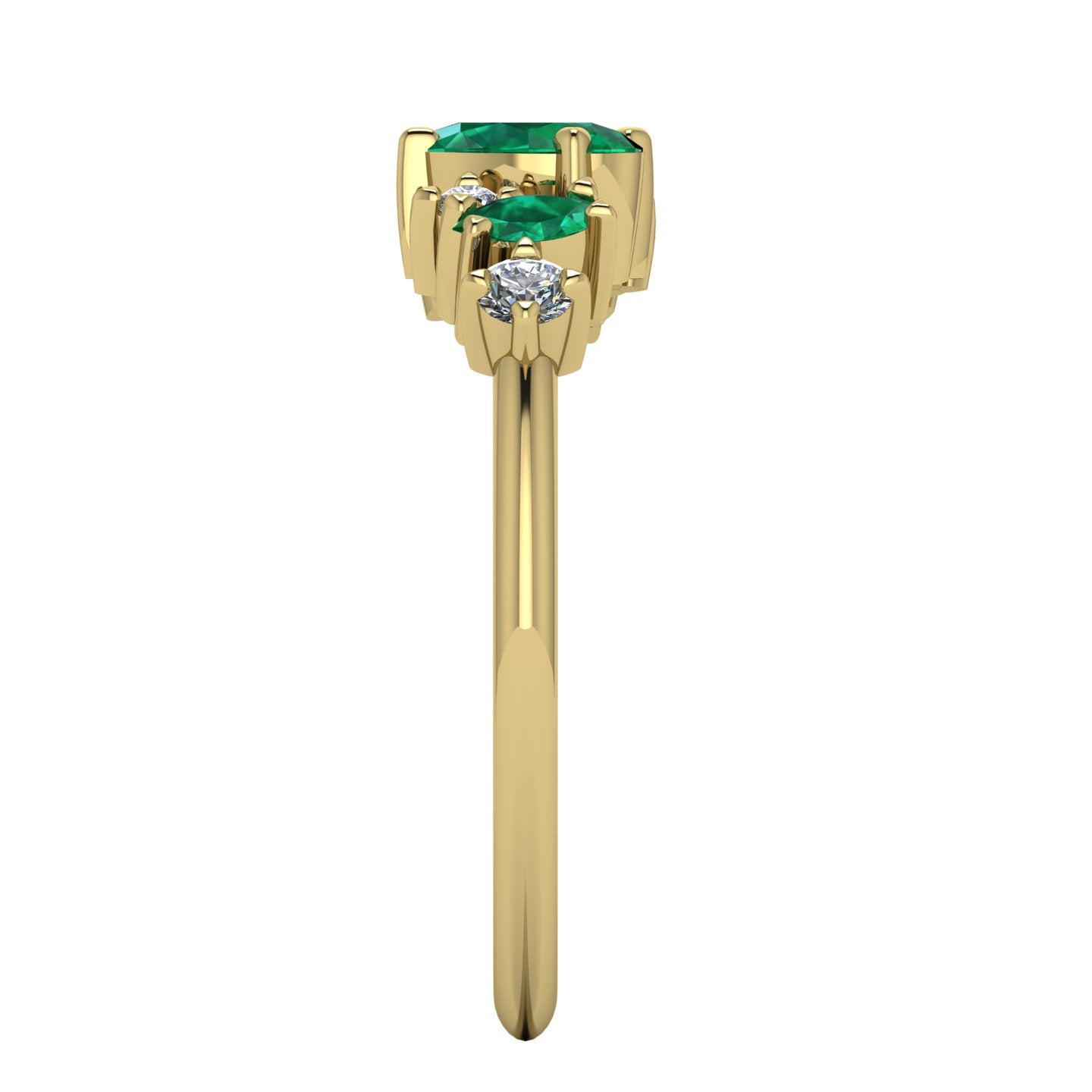 Side profile of the 18ct yellow gold emerald ring showing the multi-level settings and sculptural design.