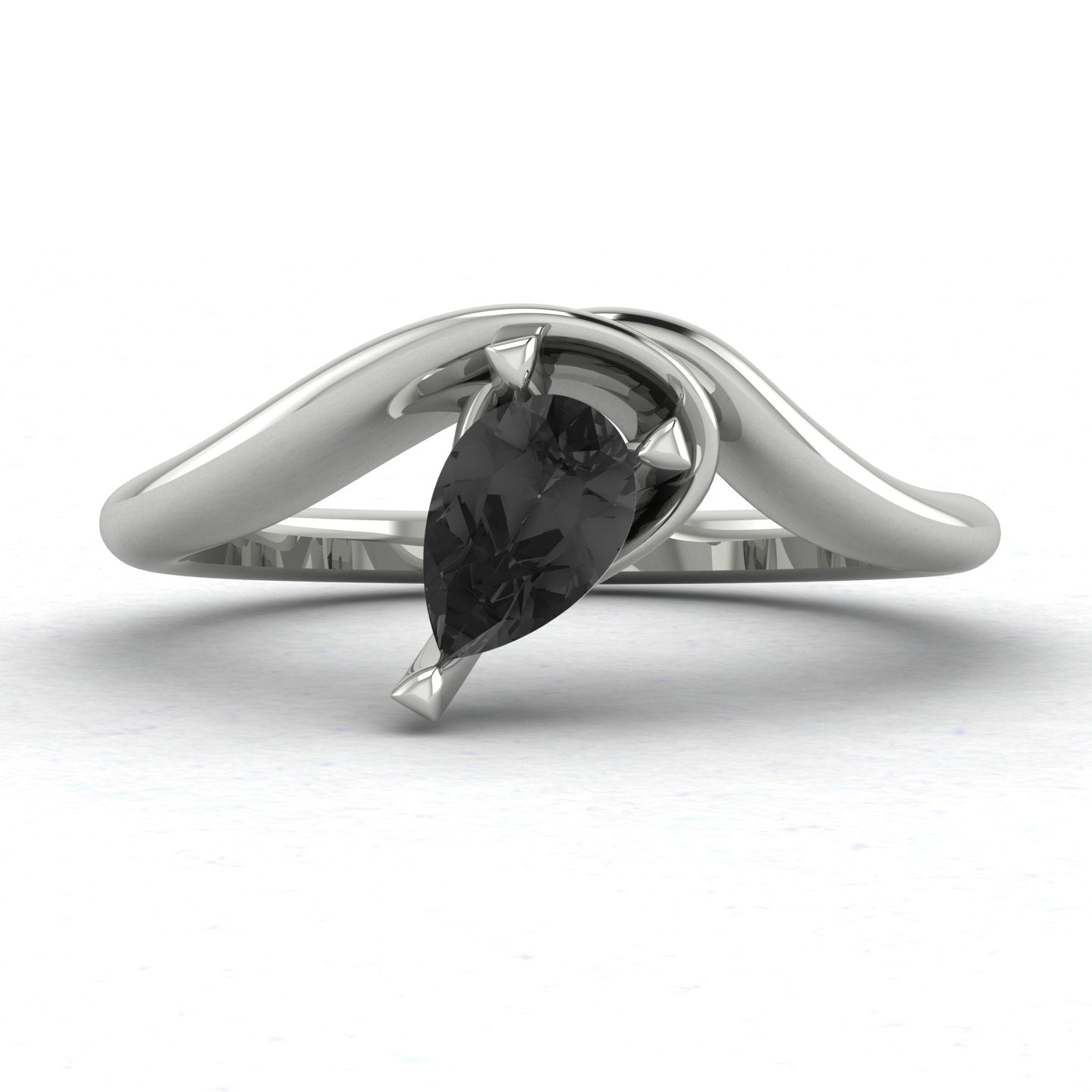 Enchanted pear shaped black diamond asymmetric solitaire engagement ring in white gold, front view showing sculptural sweeping band