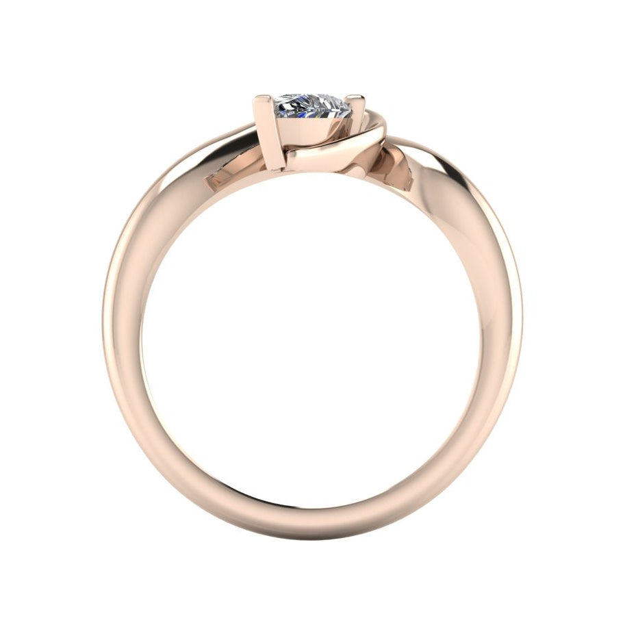 Enchanted pear diamond ring in rose gold, through-finger view showing clean interior band and low-set asymmetric profile