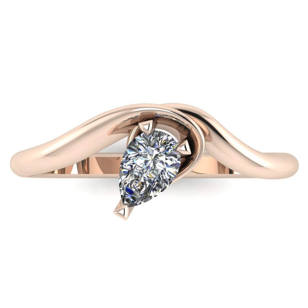 Enchanted pear shaped diamond ring in rose gold, overhead top-down view showing brilliant stone and fluid sweeping band design