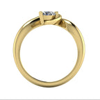 Enchanted pear diamond ring in yellow gold, side profile view showing dramatic sculptural asymmetric height and elegant sweeping band silhouette