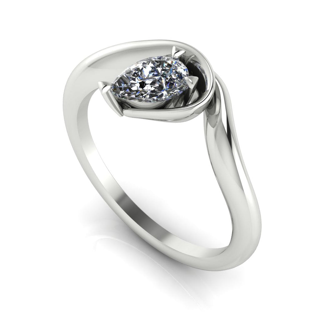 Enchanted lab grown diamond pear engagement ring in white gold, three-quarter angle view showing diamond nestled in asymmetric organic setting