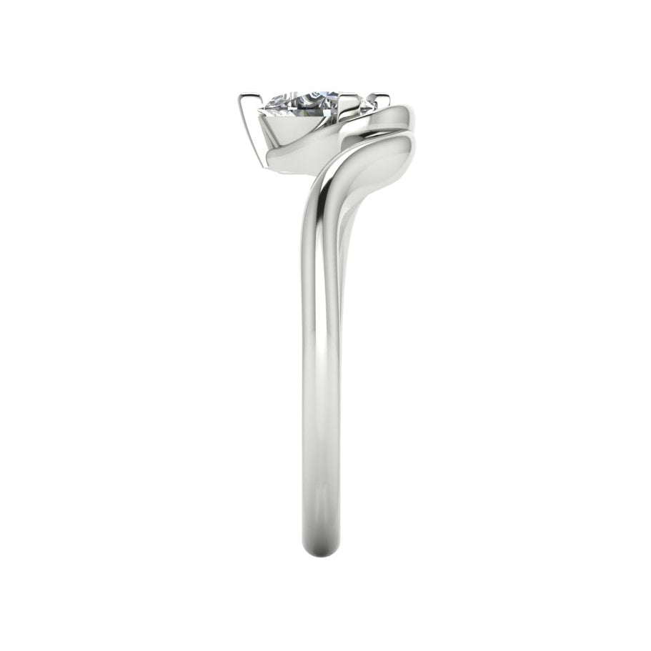Enchanted pear lab grown diamond ring in white gold, side profile view showing sculptural asymmetric height and elegant band silhouette