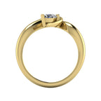 Enchanted pear diamond ring in yellow gold, through-finger profile view showing clean interior gallery and low-set asymmetric band